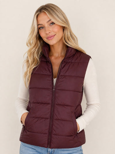 Chaleco puffer con cuello alto y bolsillos