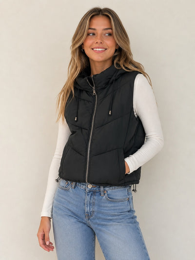 Chaleco puffer con capucha y cintura ajustable