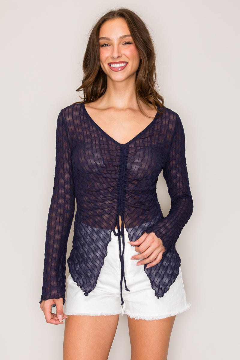 Blusa de punto calado con jareta y bajo en picos — segunda vista